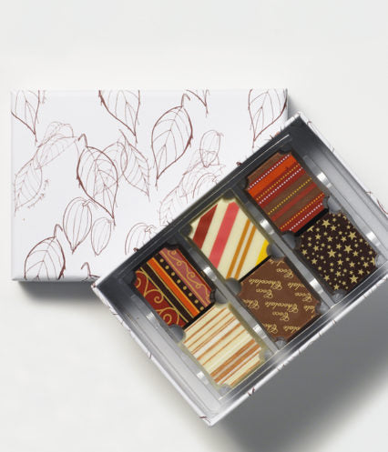 Christmas Collection Small Coco Chocolate milk chocolate gift box with coco leaf boxes in festive striped and star designs