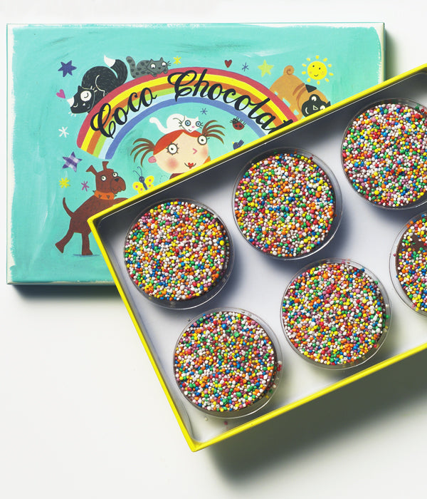 Children's Freckle Box by Coco Chocolate, aqua chocolate puzzle box with milk chocolate sprinkles in trays
