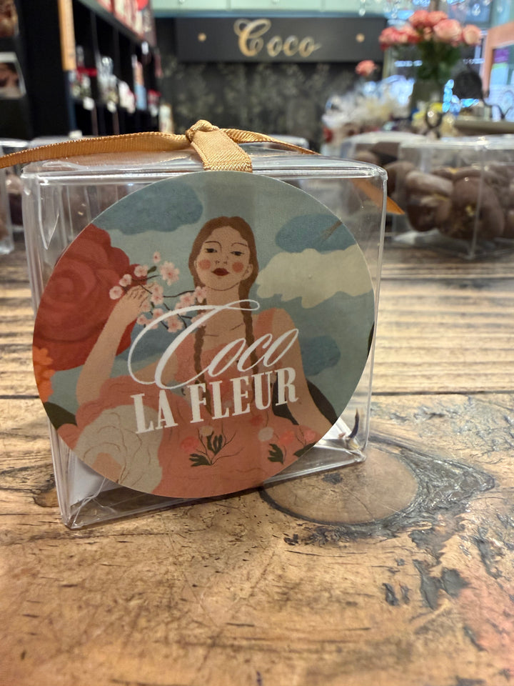 Rose Petal and Jasmine Discs by Coco Chocolate artisan chocolate cubes in clear wrap with floral card